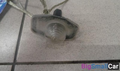 Фонарь подсветки номера от Toyota Corolla E150 2006-2013