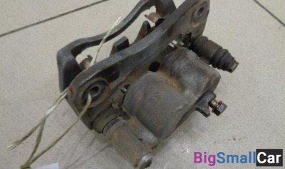 Суппорт передний левый от Subaru Outback BG 1994-1999